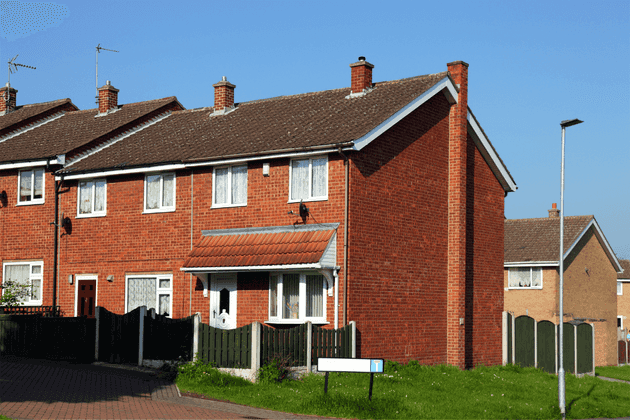 Red brick house on a sunny day