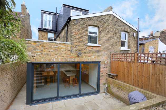 Garage converted into comfortable living space and a terrace